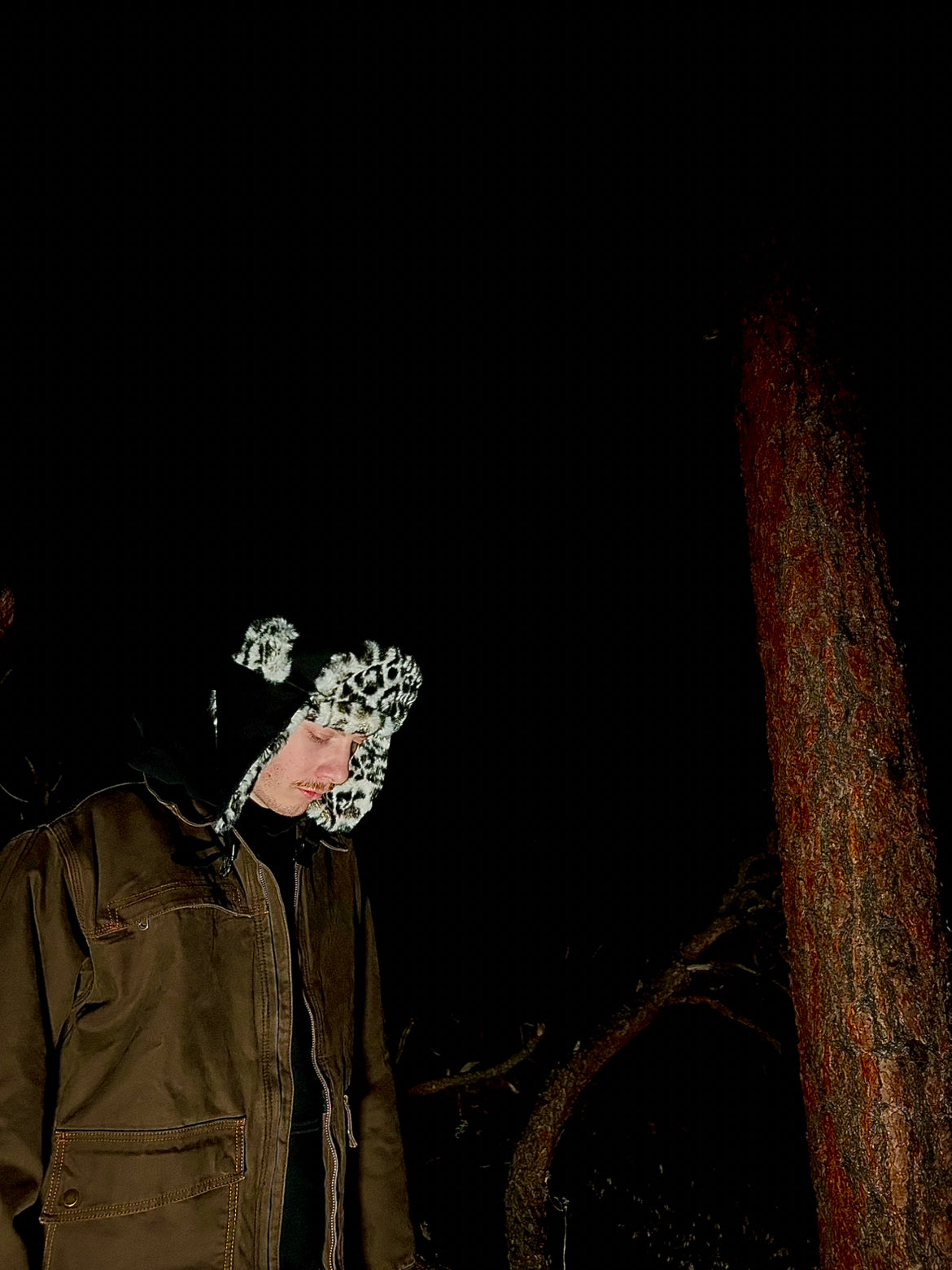 SNOW LEOPARD TRAPPER HAT